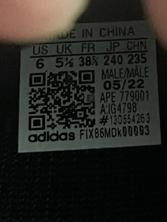 Yeezy Boost 700 MNVM Laceless Sneakers in White and Black - Picture 4 of 4